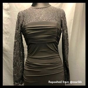 Black cocktail dress with lace details